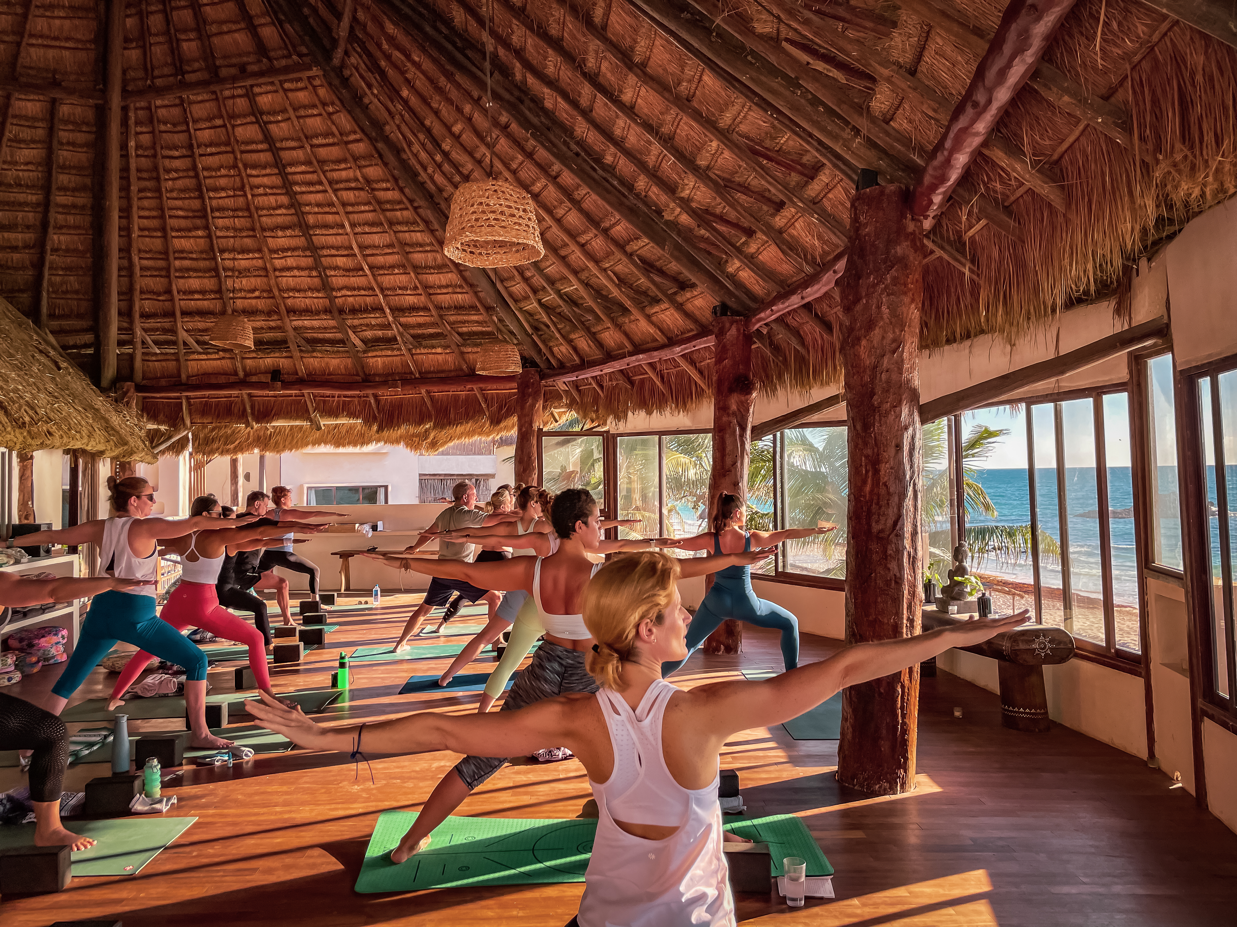 Yoga class in the beachfront shala